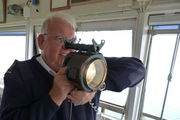 Bass Point watchkeeper Simon Segure uses Aldis Lamp & Morse Code during rescue
