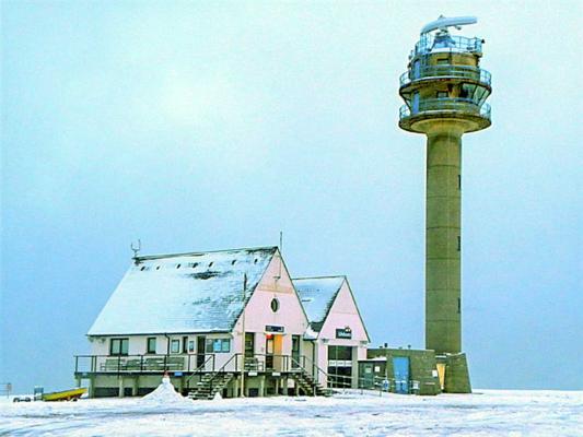 The tower and lifeboat station with snow on Calshot Spit