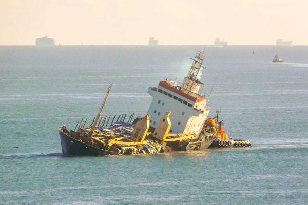 Listing ship Mekhanik Yartsev is towed into Southampton