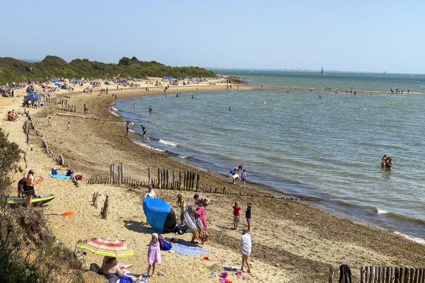 A busy beach between the lower car park and Lepe Spit