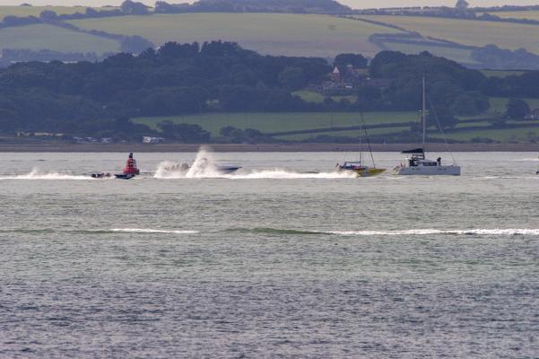 Cowes - Torquay Power Boat race passing East Lepe buoy 