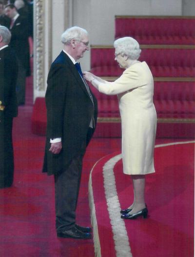 John Gifford receives his OBE from HM The Queen