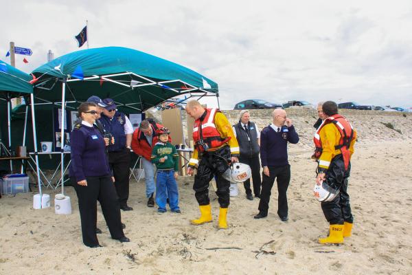 NCI Display and watchkeepers and RNLI Crew during "Beach Day"