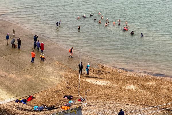 Swimmers on New Year's Day seen from NCI Calshot Tower