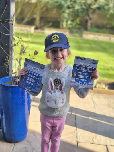 Daisy in NCI cap (shown with permission)