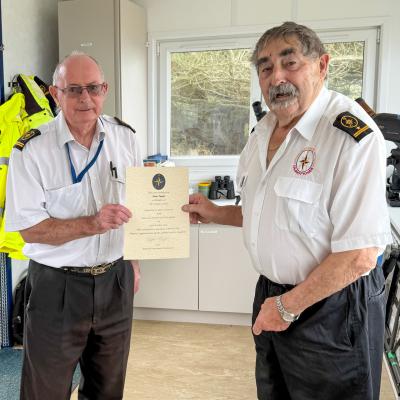 DSM(Stone Point) Peter Taylor receives his 10 year Service Certificate from SM Bryan Y.