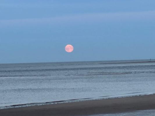 December Cold Moon over the wreck at Brancaster Staithe