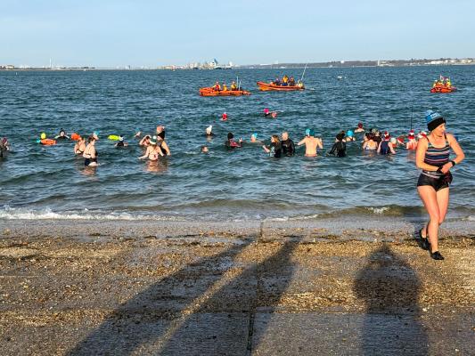 RNLI organised New Year swim beneath the Tower