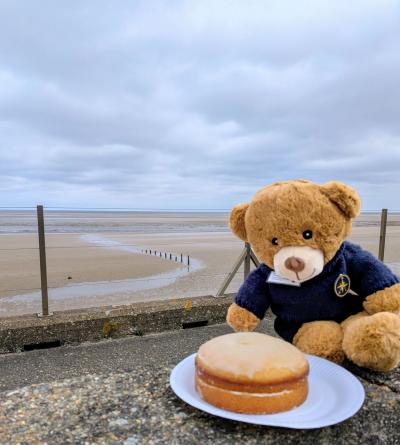 Station mascot Barney "guarding" the birthday cake