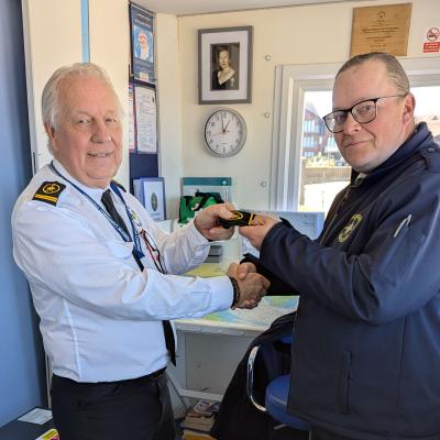 A new qualified watchkeeper, receiving his epaulettes 