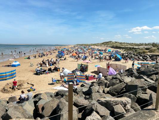 Brancaster beach on a hot Bank Holiday