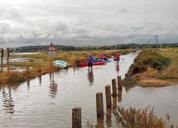 A flooded Beach Road Brancaster